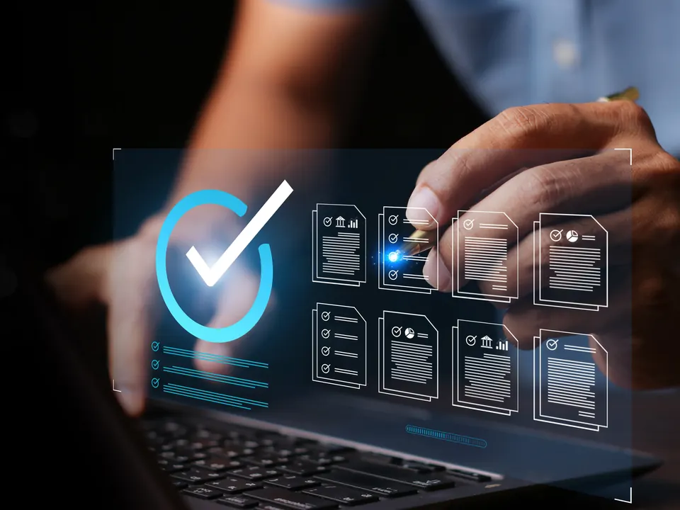 Quality assurance checklist review on a laptop screen